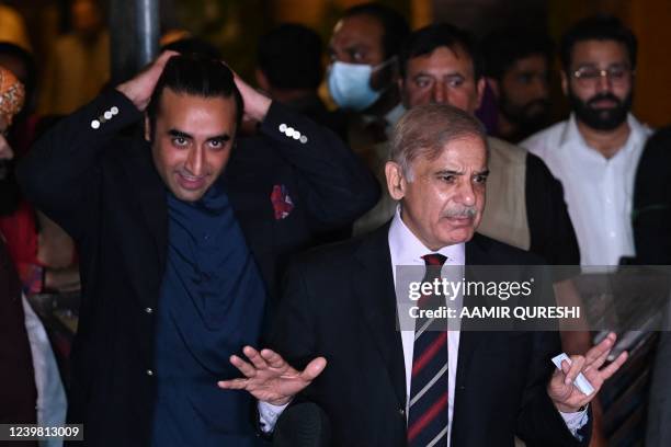 Pakistan's opposition leader Shahbaz Sharif and Bilawal Bhutto Zardari arrive for a press conference with other parties leaders in Islamabad on April...