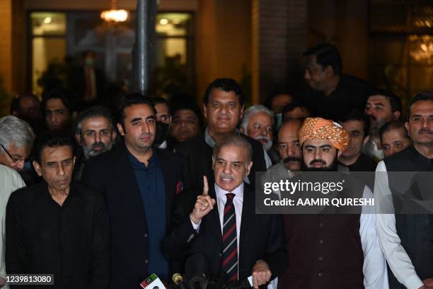 Pakistan's opposition leader Shahbaz Sharif speaks flanked by Bilawal Bhutto Zardari during a press conference with other parties leaders in...