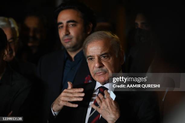 Pakistan's opposition leader Shahbaz Sharif speaks flanked by Bilawal Bhutto Zardari during a press conference with other parties leaders in...