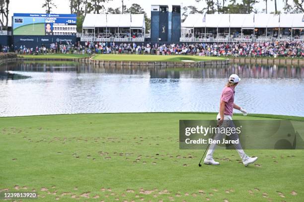 Cameron Smith of Australia watches his shot while walking off the 17th tee box during the final round of THE PLAYERS Championship on THE PLAYERS...