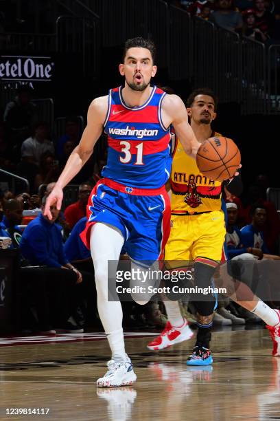 Tomas Satoransky of the Washington Wizards dribbles the ball during the game against the Atlanta Hawks on April 6, 2022 at State Farm Arena in...