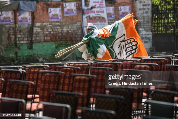Congress worker carries party flags during DPCC organized event Mehngai Mukt Bharat Abhiyan to protest against frequent hike of fuel prices, at...