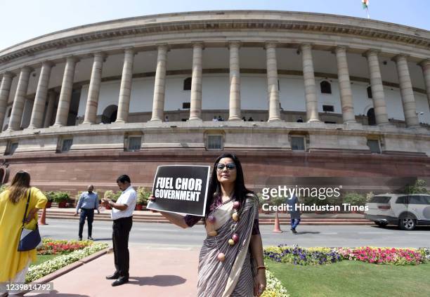 Mahua Moitra holds a placard during a protest in front of the Mahatma  News Photo - Getty Images
