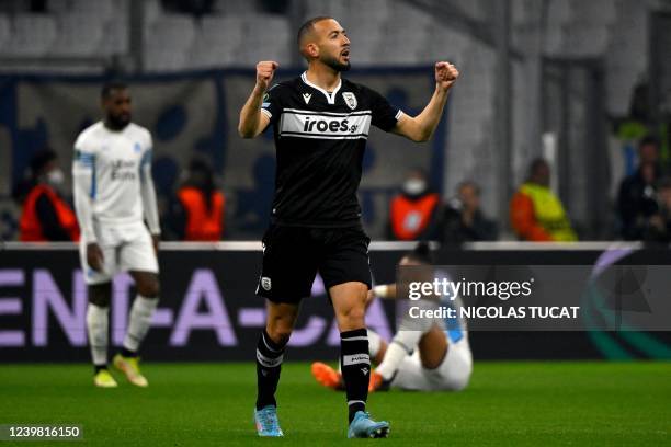 S Moroccan midfielder Omar El Kaddouri celebrates after scoring a goal during the Europa Conference League quarter final match between Olympique de...