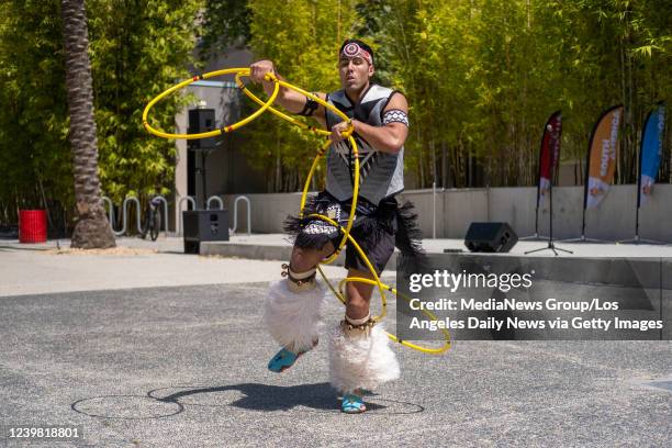 Northridge, CA Lumbee Tribe member Eric Hernandez performs a Native American Hoop Dance during California State University Northridge's Carnaval...