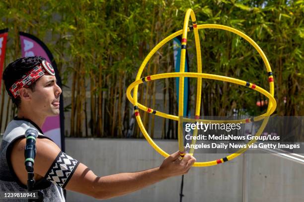 Northridge, CA Lumbee Tribe member Eric Hernandez performs a Native American Hoop Dance during California State University Northridge's Carnaval...