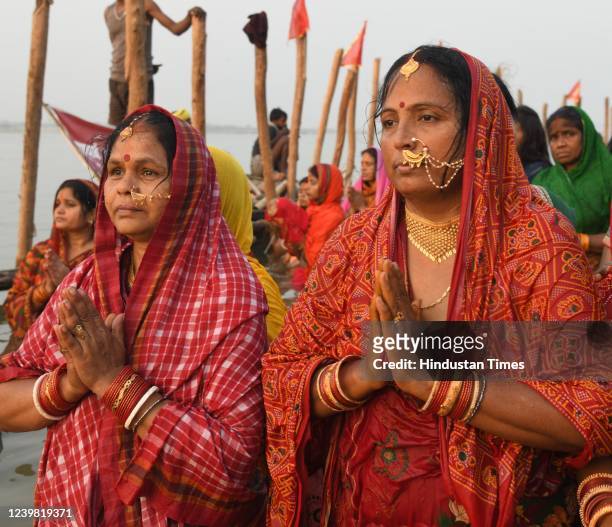 Chhath devotees perform rituals in the Ganga river at Danapur Ghat during Chaiti Chhath Puja festival on April 7, 2022 in Patna, India.