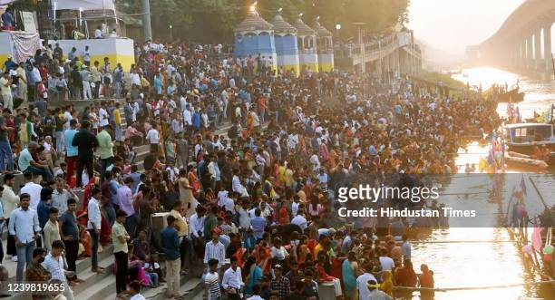 Gather of devotees at the bank of Ganga river during Chaiti Chhath Puja festival at Gandhi Ghat on April 7, 2022 in Patna, India.