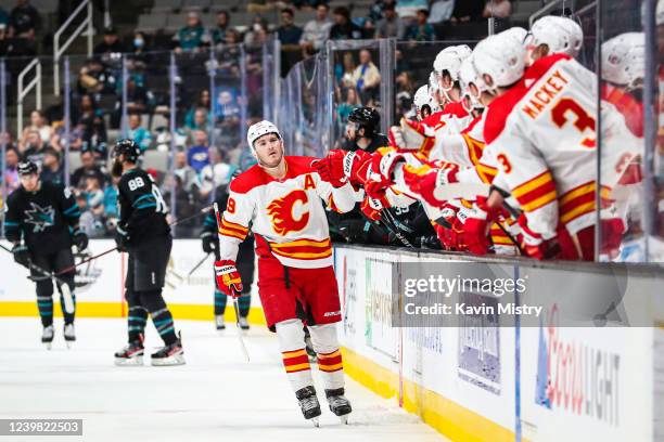 Matthew Tkachuk of the Calgary Flames celebrates goal with teammates against the San Jose Sharks at SAP Center on April 7, 2022 in San Jose,...