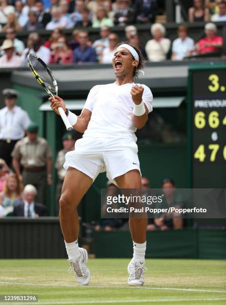 Rafael Nadal of Spain celebrates after defeating Lukas Rosol of the Czech Republic during the men's singles second round on day four of the Wimbledon...