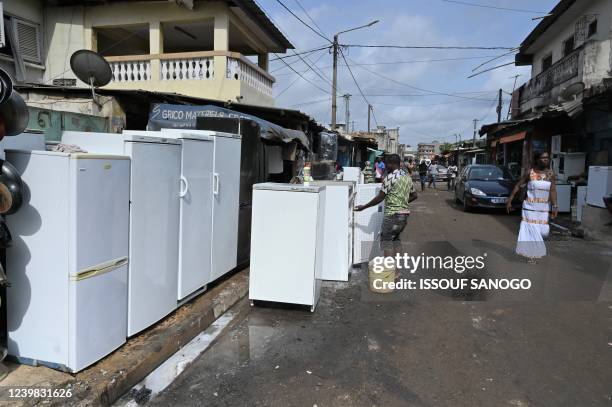 General view of a second-hand refrigerator market, called "appareil France aurevoir", in the popular district of Adjame in Abidjan on April 8, 2022.