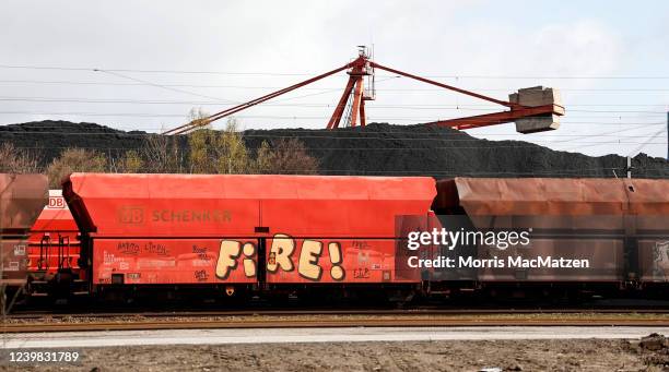 Coal imported from abroad lies at Hamburg Port after unloading from ships on April 8, 2022 in Hamburg, Germany. Germany is supporting the European...