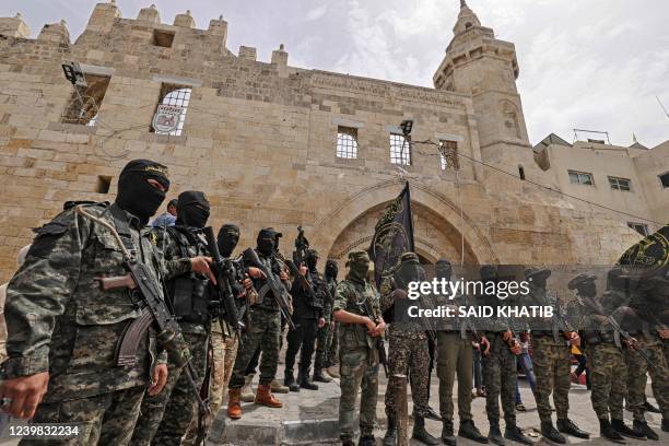 Members of the Islamic Jihad militant group take part in a rally alongside Hamas supporters after Friday prayers in Khan Yunis The Southern Gaza...