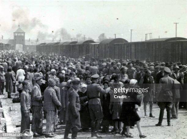 Photo taken 27 May 1944 in Oswiecim, showing Nazis selecting prisoners on the platform at the entrance of the Auschwitz-Birkenau extermination camp....