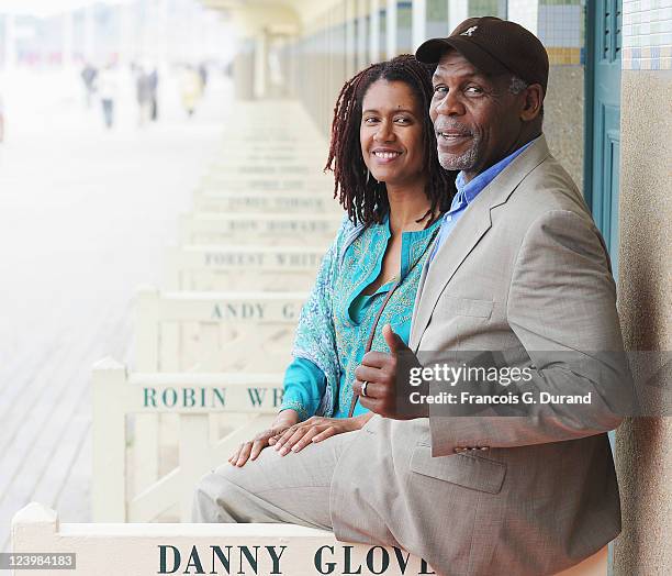 Actor Danny Glover and his wife Asake Bomani attend an homage ceremony at Promenade des planches during the 37th Deauville American Film Festival on...