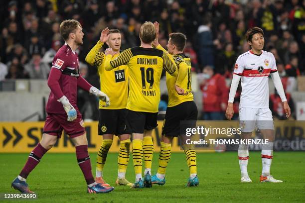 Dortmund's German forward Julian Brandt celebrates scoring his second goal with his teammates during the German first division Bundesliga football...