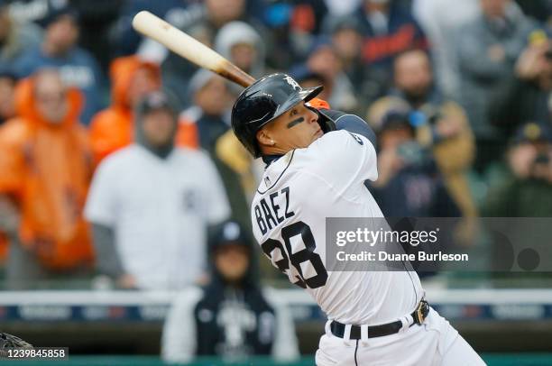 Javier Baez of the Detroit Tigers hits a walk-off single to drive in Austin Meadows and defeat the Chicago White Sox 5-4 on Opening Day at Comerica...