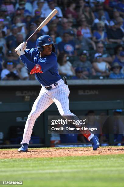 Ed Howard of the Chicago Cubs bats during the sixth inning of an MLB spring training game against the Kansas City Royals at Sloan Park on March 27,...