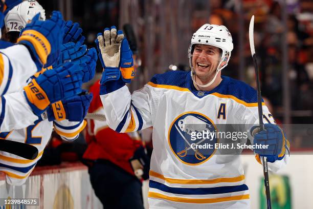 Mark Pysyk of the Buffalo Sabres celebrates his goal with teammates during the first period against the Florida Panthers at the FLA Live Arena on...
