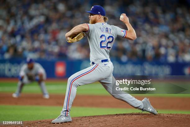 Jon Gray of the Texas Rangers pitches during the first inning of their MLB game against the Toronto Blue Jays on Opening Day at Rogers Centre on...