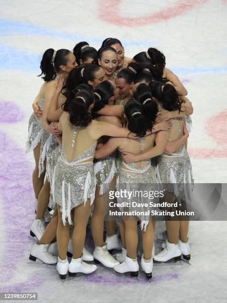 Members of Team Les Supremes from Canada celebrate after they perform during the ISU World Synchronized Skating Championships 2022 at FirstOntario...