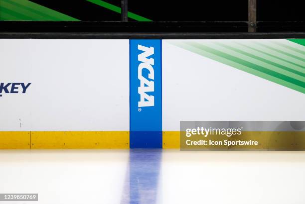 The NCAA logo on the blue line during a Frozen Four semifinal between the Michigan Wolverines and the Denver Pioneers on April 7, 2022 at TD Garden...