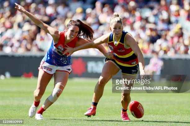 Gabrielle Colvin of the Demons competes with Ashleigh Woodland of the Crows during the 2022 AFLW Grand Final match between the Adelaide Crows and the...