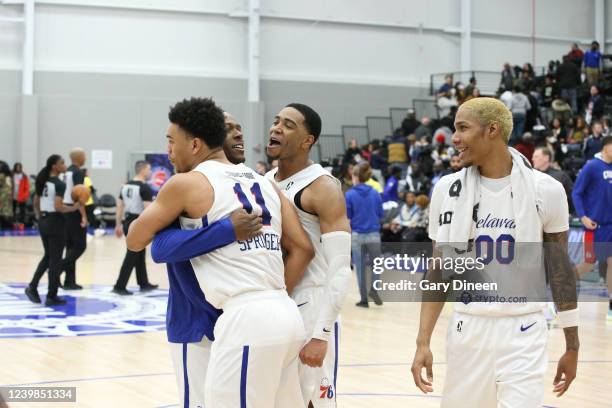 The Delaware Blue Coats celebrate after an NBA G-League playoff game on April 8, 2022 at Wayne State Fieldhouse in Detroit, Michigan. NOTE TO USER:...