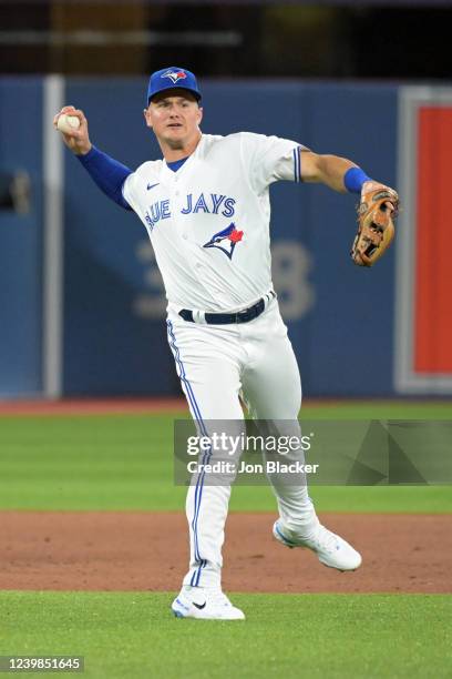 Matt Chapman of the Toronto Blue Jays fields a ball during the game between the Texas Rangers and the Toronto Blue Jays at Rogers Centre on Friday,...