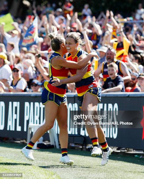 Danielle Ponter of the Crows celebrates a goal with Hannah Munyard of the Crows during the 2022 AFLW Grand Final match between the Adelaide Crows and...