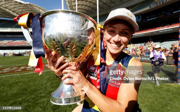Erin Phillips of the Crows poses for a photo with the premiership cup during the 2022 AFLW Grand Final match between the Adelaide Crows and the...