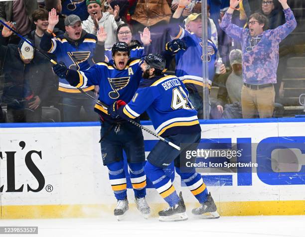 St. Louis Blues center Brayden Schenn celebrates with St. Louis Blues defenseman Robert Bortuzo after scoring the tying goal in the third period...