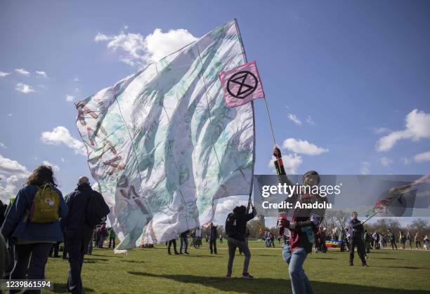 Extinction Rebellion" members stage a protest at Hyde Park against fossil fuel usage in London, United Kingdom on April 09, 2022.