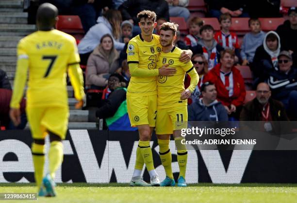 Chelsea's German midfielder Kai Havertz celebrates with Chelsea's German striker Timo Werner after scoring the fourth goal during the English Premier...