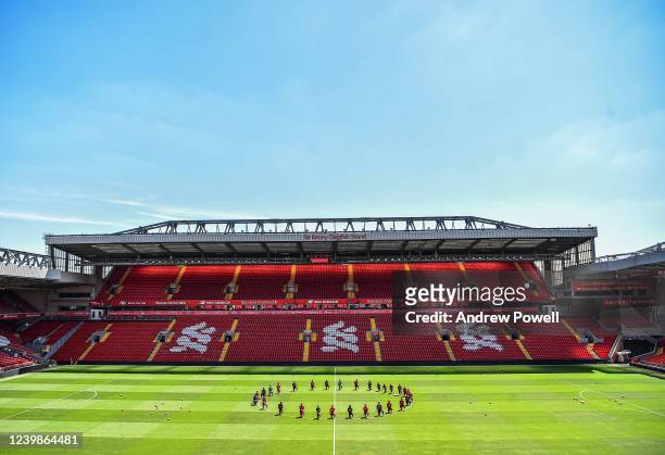 Liverpool players take a knee in memory of George Floyd at Anfield on June 01, 2020 in Liverpool, England.