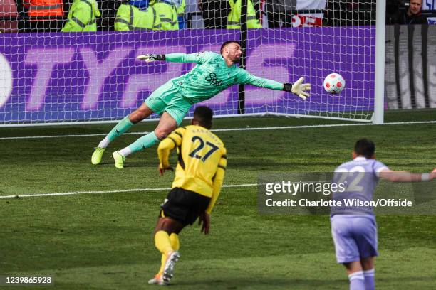 Jack Harrison of Leeds puts the ball past Watford goalkeeper Ben Foster to score their 3rd goal during the Premier League match between Watford and...