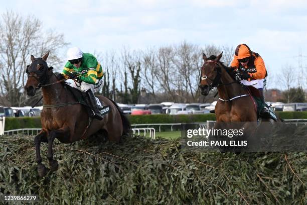 Eventual winner Noble Yeats ridden by jockey Sam Waley-Cohen and runner-up Any Second Now ridden by jockey Mark Walsh jump the final fence in the...