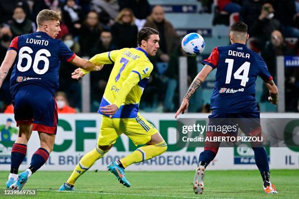 Juventus' Serbian forward Dusan Vlahovic eyes the ball during the Italian Serie A football match between Cagliari and Juventus at the Unipol Domus...