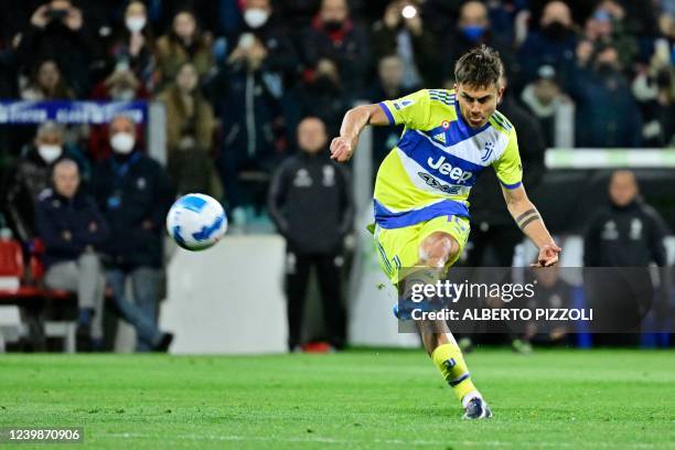 Juventus' Argentine forward Paulo Dybala kicks the ball during the Italian Serie A football match between Cagliari and Juventus at the Unipol Domus...