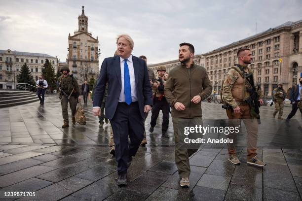 British Prime Minister Boris Johnson and Ukrainian President Volodymyr Zelenskyy walk at Khreschatyk Street and Independence Square during their...