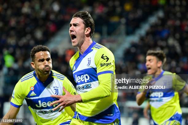 Juventus' Serbian forward Dusan Vlahovic celebrates after scoring his team's second goal during the Italian Serie A football match between Cagliari...