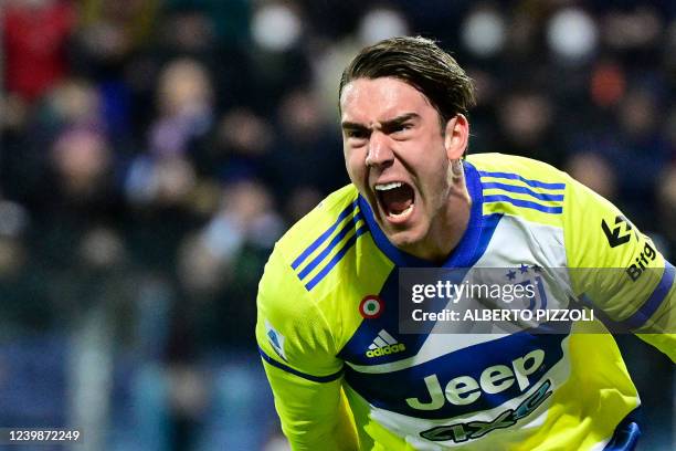 Juventus' Serbian forward Dusan Vlahovic celebrates after scoring his team's second goal during the Italian Serie A football match between Cagliari...