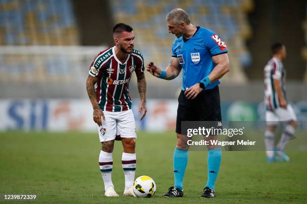 Nathan of Fluminense talks to referee Anderson Daronco during a match between Fluminense and Santos as part of Brasileirao 2022 at Maracana Stadium...