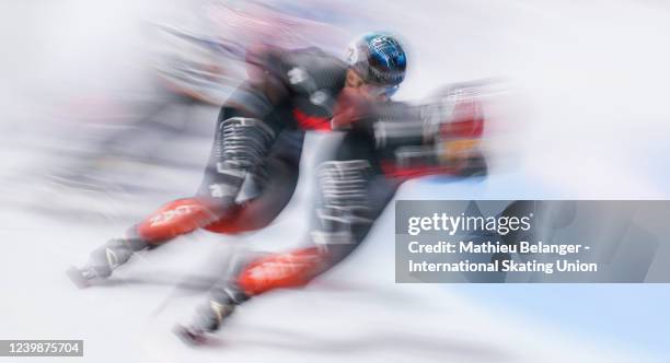 Pascal Dion of Canada and Steven Dubois of Canada skates during the 1500m race at the World Short Track Speed Skating Championships at Maurice...