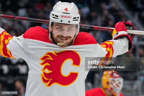 Rasmus Andersson of the Calgary Flames reacts during the second period in the game between the Calgary Flames and the Seattle Kraken at Climate...
