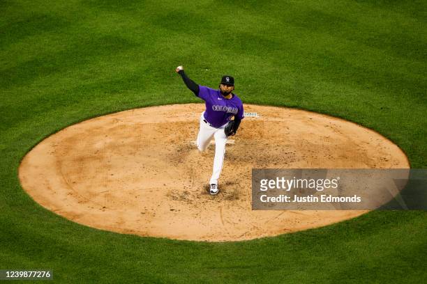 Starting pitcher German Marquez of the Colorado Rockies delivers to home plate in the fifth inning against the Los Angeles Dodgers at Coors Field on...