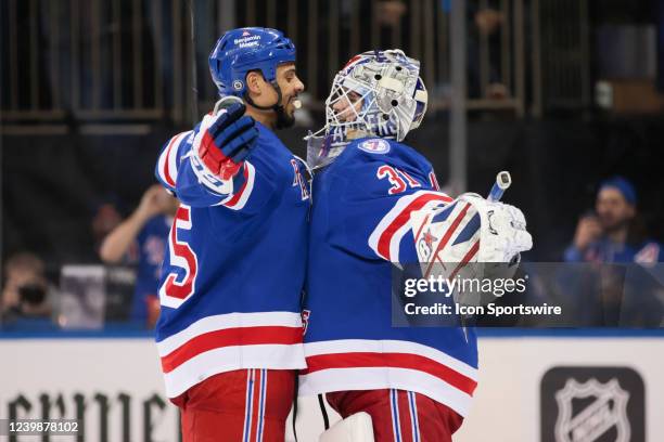 New York Rangers Right Wing Ryan Reaves chest bumps New York Rangers Goaltender Igor Shesterkin as the Rangers celebrate clinching a playoff berth...