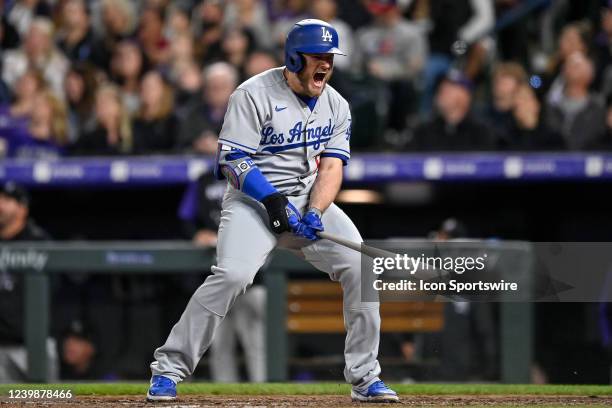 Los Angeles Dodgers first baseman Max Muncy reacts after flying out with the bases loaded and two outs in the eighth inning during a game between the...