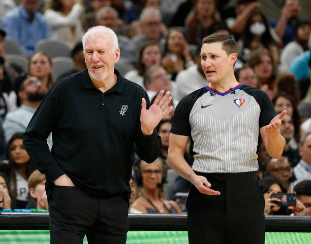 San Antonio Spurs head coach Gregg Popovich reacts to a call by official JD DeRosa during game against the Golden State Warriors in the second half...