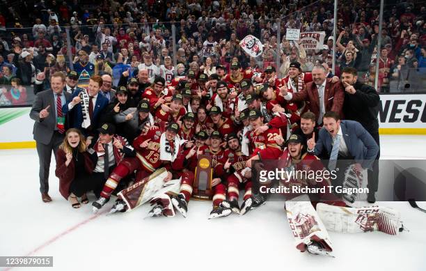 The Denver Pioneers celebrate with the NCAA championship trophy after the Pioneers captured the NCAA title against the Minnesota State Mavericks 5-1...